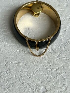 Gold-Tone Black Enamel Cuff Bracelet with Safety Chain